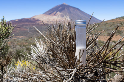 A vial of the dehydrated Explorer Starter in front of Mount Teide volcano, Tenerife